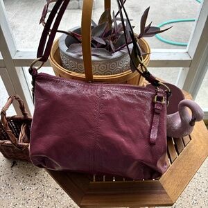 Purple patent leather coach shoulder bag with adjustable strap